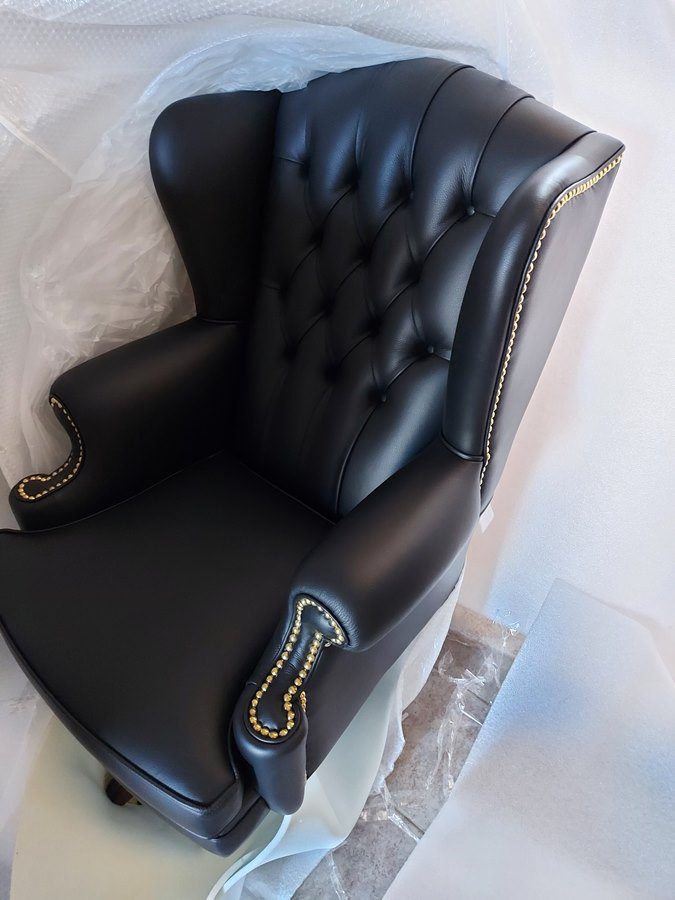 sillón de cuero negro para despacho para la presidenta